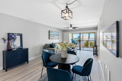 Premium WATERFRONT CORNER CONDO WITH PANORAMIC WATER VIEWS ON on Isla Del Sol Yacht and Country Club in Florida - for sale on GolfHomes.com, golf home, golf lot