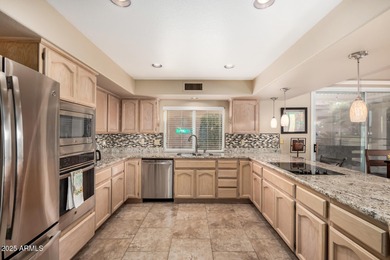 Gorgeous home with fantastic LAKE VIEWS located on HOLES 13 & on Palo Verde Golf and Country Club in Arizona - for sale on GolfHomes.com, golf home, golf lot