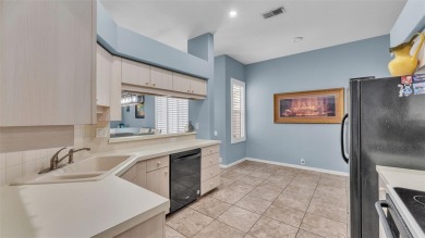 Enjoy peaceful golf course and water views from this 2-bedroom on Imperial Lakes Country Club in Florida - for sale on GolfHomes.com, golf home, golf lot