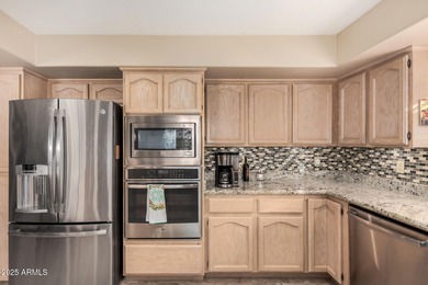 Gorgeous home with fantastic LAKE VIEWS located on HOLES 13 & on Palo Verde Golf and Country Club in Arizona - for sale on GolfHomes.com, golf home, golf lot