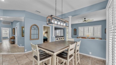 Enjoy peaceful golf course and water views from this 2-bedroom on Imperial Lakes Country Club in Florida - for sale on GolfHomes.com, golf home, golf lot