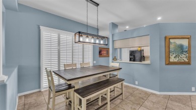 Enjoy peaceful golf course and water views from this 2-bedroom on Imperial Lakes Country Club in Florida - for sale on GolfHomes.com, golf home, golf lot