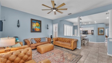 Enjoy peaceful golf course and water views from this 2-bedroom on Imperial Lakes Country Club in Florida - for sale on GolfHomes.com, golf home, golf lot