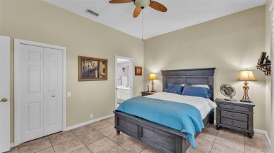 Enjoy peaceful golf course and water views from this 2-bedroom on Imperial Lakes Country Club in Florida - for sale on GolfHomes.com, golf home, golf lot