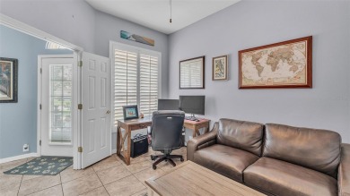 Enjoy peaceful golf course and water views from this 2-bedroom on Imperial Lakes Country Club in Florida - for sale on GolfHomes.com, golf home, golf lot