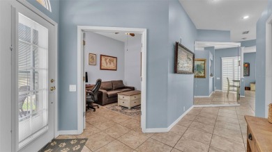 Enjoy peaceful golf course and water views from this 2-bedroom on Imperial Lakes Country Club in Florida - for sale on GolfHomes.com, golf home, golf lot
