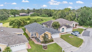 Enjoy peaceful golf course and water views from this 2-bedroom on Imperial Lakes Country Club in Florida - for sale on GolfHomes.com, golf home, golf lot