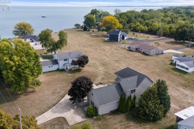 Are you interested in a home with BREATHTAKING LAKE VIEWS? This on Catawba Island Club in Ohio - for sale on GolfHomes.com, golf home, golf lot