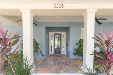 Fall in love with this stunning custom pool home featuring a on Harmony Golf Preserve in Florida - for sale on GolfHomes.com, golf home, golf lot