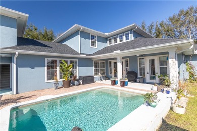 Fall in love with this stunning custom pool home featuring a on Harmony Golf Preserve in Florida - for sale on GolfHomes.com, golf home, golf lot