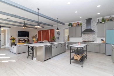 Fall in love with this stunning custom pool home featuring a on Harmony Golf Preserve in Florida - for sale on GolfHomes.com, golf home, golf lot