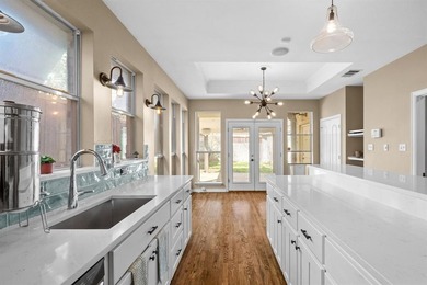 Some Dallas homes you walk into and immediately feel it. This is on Tenison Park Golf Club in Texas - for sale on GolfHomes.com, golf home, golf lot