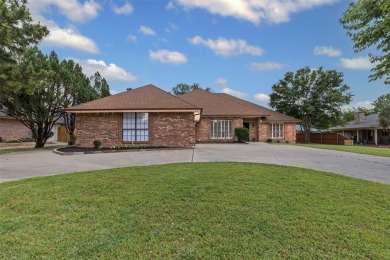 Discover the potential of this charming home featuring a great on De Cordova Bend Country Club in Texas - for sale on GolfHomes.com, golf home, golf lot