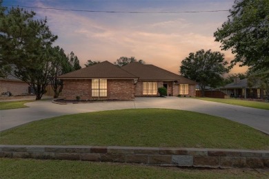 Discover the potential of this charming home featuring a great on De Cordova Bend Country Club in Texas - for sale on GolfHomes.com, golf home, golf lot