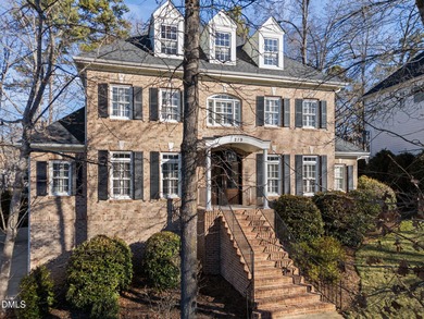 Welcome to 219 Brown Bear, a stately brick colonial residence in on The Preserve At Jordan Lake Golf Club in North Carolina - for sale on GolfHomes.com, golf home, golf lot