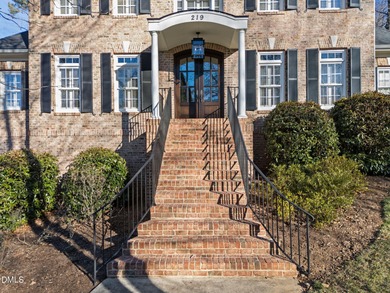 Welcome to 219 Brown Bear, a stately brick colonial residence in on The Preserve At Jordan Lake Golf Club in North Carolina - for sale on GolfHomes.com, golf home, golf lot