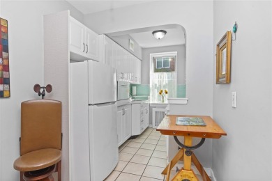 Welcome home to this beautifully appointed two-bedroom, two-bath on Pelham Country Club in New York - for sale on GolfHomes.com, golf home, golf lot
