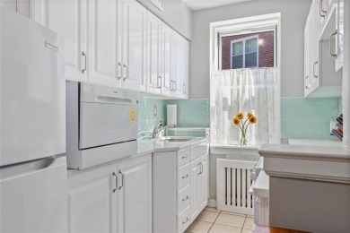 Welcome home to this beautifully appointed two-bedroom, two-bath on Pelham Country Club in New York - for sale on GolfHomes.com, golf home, golf lot