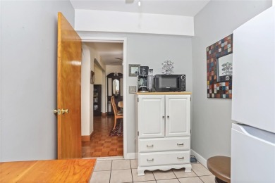 Welcome home to this beautifully appointed two-bedroom, two-bath on Pelham Country Club in New York - for sale on GolfHomes.com, golf home, golf lot