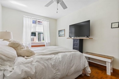 Welcome home to this beautifully appointed two-bedroom, two-bath on Pelham Country Club in New York - for sale on GolfHomes.com, golf home, golf lot