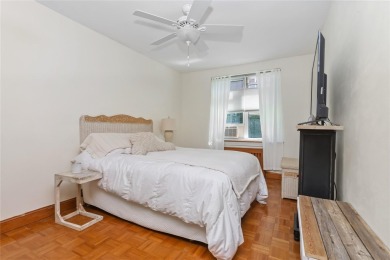 Welcome home to this beautifully appointed two-bedroom, two-bath on Pelham Country Club in New York - for sale on GolfHomes.com, golf home, golf lot