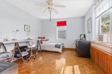 Welcome home to this beautifully appointed two-bedroom, two-bath on Pelham Country Club in New York - for sale on GolfHomes.com, golf home, golf lot