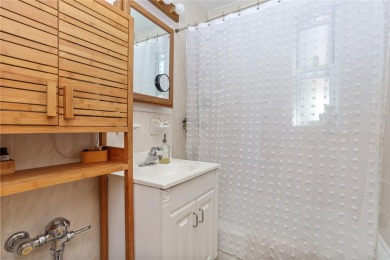 Welcome home to this beautifully appointed two-bedroom, two-bath on Pelham Country Club in New York - for sale on GolfHomes.com, golf home, golf lot