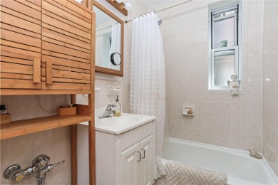 Welcome home to this beautifully appointed two-bedroom, two-bath on Pelham Country Club in New York - for sale on GolfHomes.com, golf home, golf lot