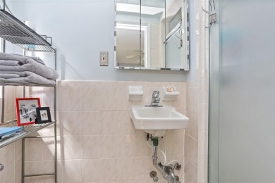 Welcome home to this beautifully appointed two-bedroom, two-bath on Pelham Country Club in New York - for sale on GolfHomes.com, golf home, golf lot