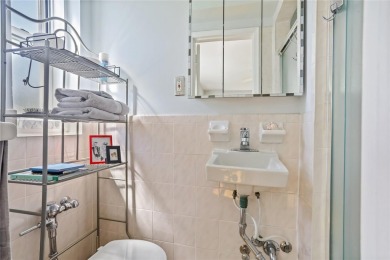 Welcome home to this beautifully appointed two-bedroom, two-bath on Pelham Country Club in New York - for sale on GolfHomes.com, golf home, golf lot