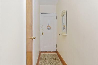 Welcome home to this beautifully appointed two-bedroom, two-bath on Pelham Country Club in New York - for sale on GolfHomes.com, golf home, golf lot