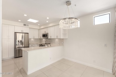 This beautiful 2-bedroom townhome in the exclusive Oasis at on Gainey Ranch Golf Club in Arizona - for sale on GolfHomes.com, golf home, golf lot