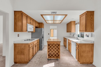 Charming two-bedroom, two-bath home in the guard-gated lake on La Quinta Golf  Resort and Country Clubs in California - for sale on GolfHomes.com, golf home, golf lot