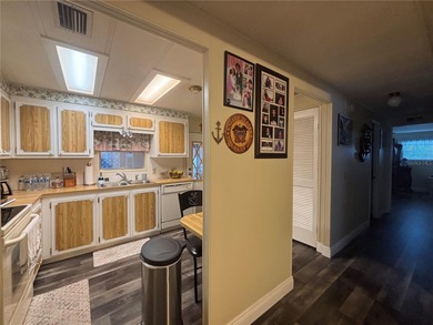 Welcome to a sought-after 55+ golf course community! This on Zellwood Station Country Club in Florida - for sale on GolfHomes.com, golf home, golf lot