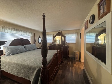 Welcome to a sought-after 55+ golf course community! This on Zellwood Station Country Club in Florida - for sale on GolfHomes.com, golf home, golf lot