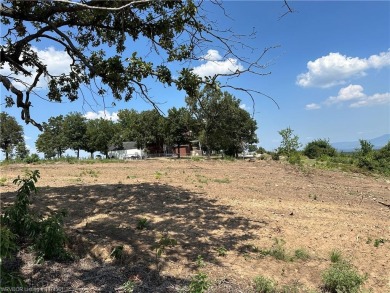 Approximately 1 acre building lot located on the Wolf Mountain on Wolf Ridge Golf Course in Oklahoma - for sale on GolfHomes.com, golf home, golf lot