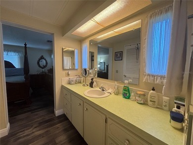 Welcome to a sought-after 55+ golf course community! This on Zellwood Station Country Club in Florida - for sale on GolfHomes.com, golf home, golf lot