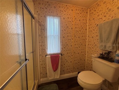 Welcome to a sought-after 55+ golf course community! This on Zellwood Station Country Club in Florida - for sale on GolfHomes.com, golf home, golf lot