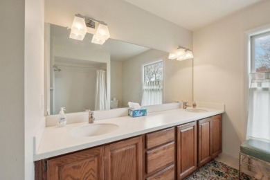 Timeless Richard Adams Russell design in prestigious Travis on Travis Pointe Country Club in Michigan - for sale on GolfHomes.com, golf home, golf lot