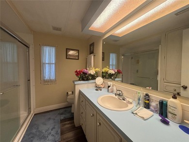 Welcome to a sought-after 55+ golf course community! This on Zellwood Station Country Club in Florida - for sale on GolfHomes.com, golf home, golf lot