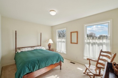 Timeless Richard Adams Russell design in prestigious Travis on Travis Pointe Country Club in Michigan - for sale on GolfHomes.com, golf home, golf lot
