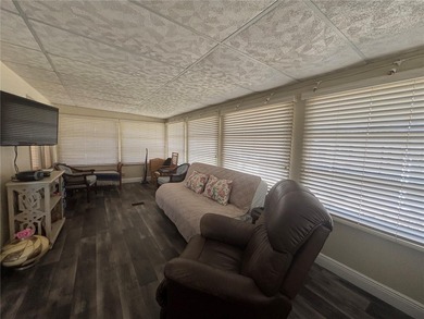 Welcome to a sought-after 55+ golf course community! This on Zellwood Station Country Club in Florida - for sale on GolfHomes.com, golf home, golf lot