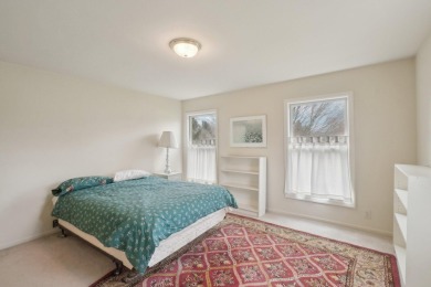 Timeless Richard Adams Russell design in prestigious Travis on Travis Pointe Country Club in Michigan - for sale on GolfHomes.com, golf home, golf lot