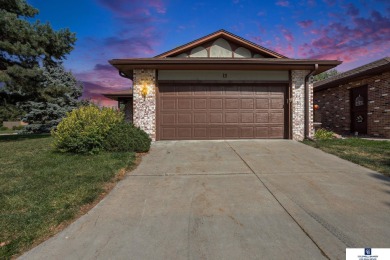 Welcome to desirable Wellington Greens! This end-unit ranch on Wellington Greens Golf Course in Nebraska - for sale on GolfHomes.com, golf home, golf lot