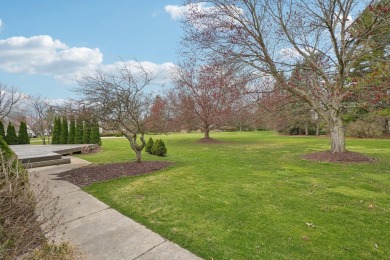 Timeless Richard Adams Russell design in prestigious Travis on Travis Pointe Country Club in Michigan - for sale on GolfHomes.com, golf home, golf lot