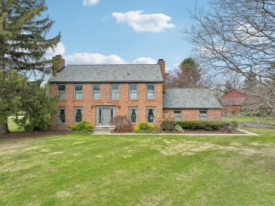 Timeless Richard Adams Russell design in prestigious Travis on Travis Pointe Country Club in Michigan - for sale on GolfHomes.com, golf home, golf lot