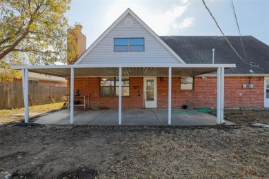 Move in ready! This home sits on a nearly  1/4  acre lot  is on Adams Municipal Golf Course in Oklahoma - for sale on GolfHomes.com, golf home, golf lot