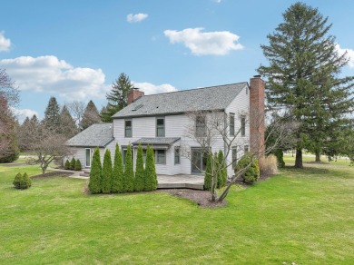 Timeless Richard Adams Russell design in prestigious Travis on Travis Pointe Country Club in Michigan - for sale on GolfHomes.com, golf home, golf lot