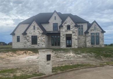 The luxurious details and functional layout of this new on The Bridges Golf Club in Texas - for sale on GolfHomes.com, golf home, golf lot