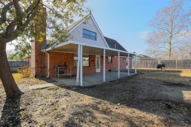 Move in ready! This home sits on a nearly  1/4  acre lot  is on Adams Municipal Golf Course in Oklahoma - for sale on GolfHomes.com, golf home, golf lot